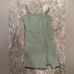 Green romper/dress. Built in shorts. Size small.